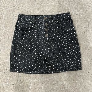black jean skirt with pink flowers